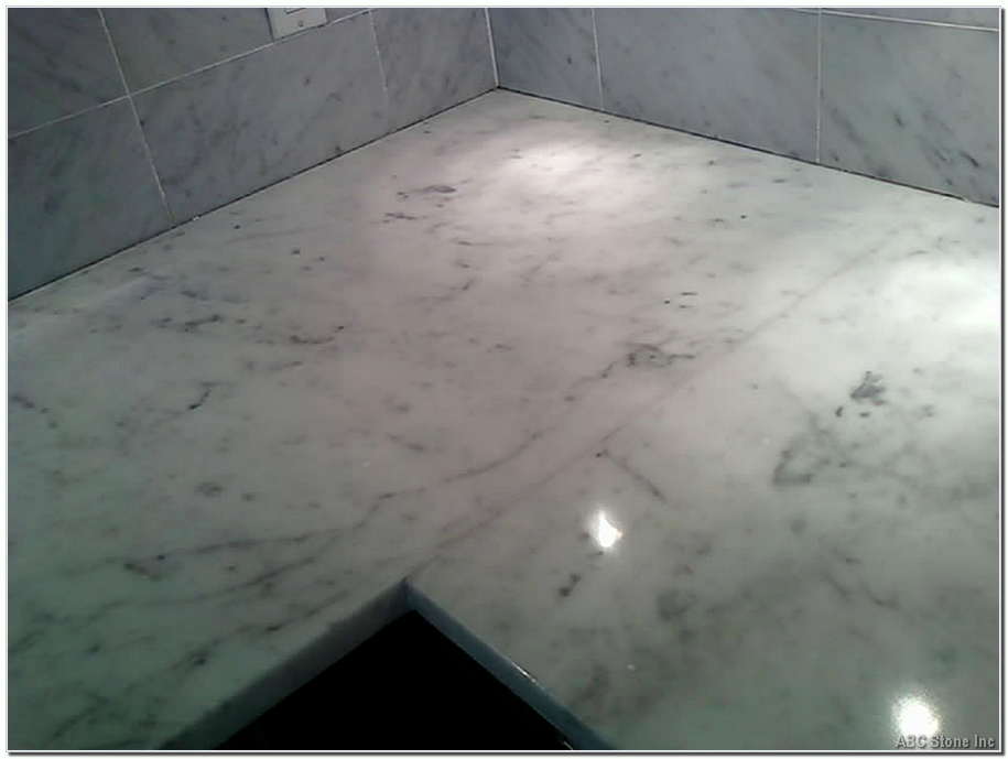 Marble backsplash with old caulking removed