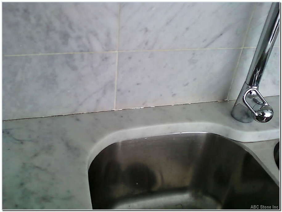Before image of a counter top back splash