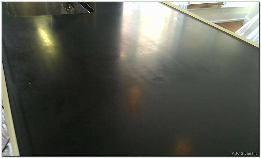 Restored black absolute countertop surface