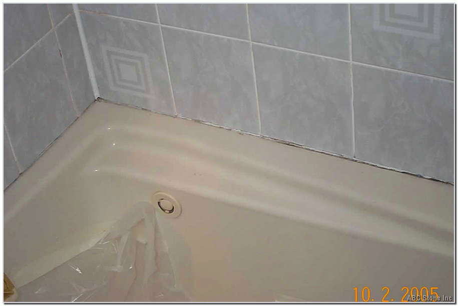 caulking restoration image Before Re Caulking. Walls & Tub