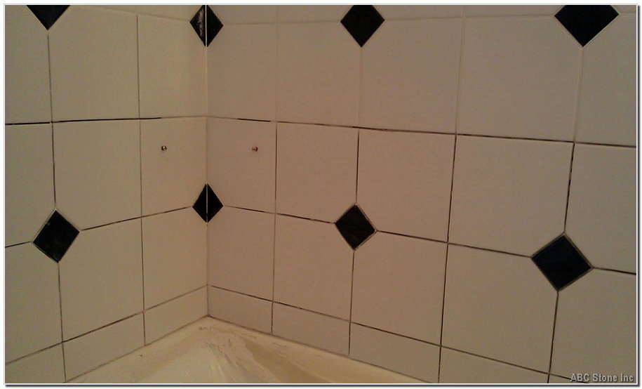 Re grouting ceramic shower walls