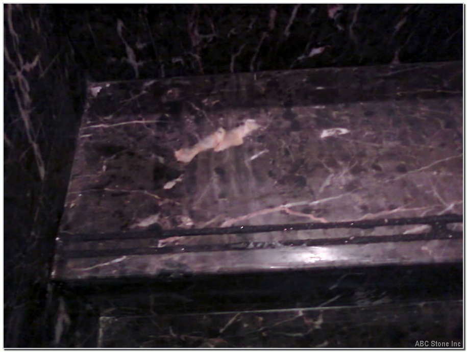 Marble step with repaired chip