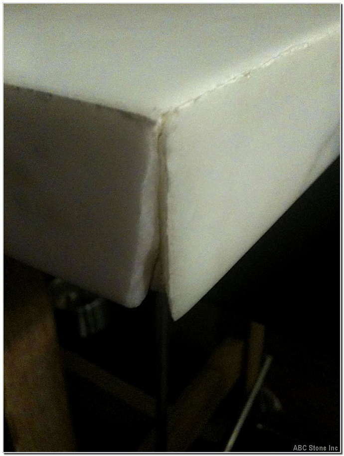 Close up of potato chip on a table corner