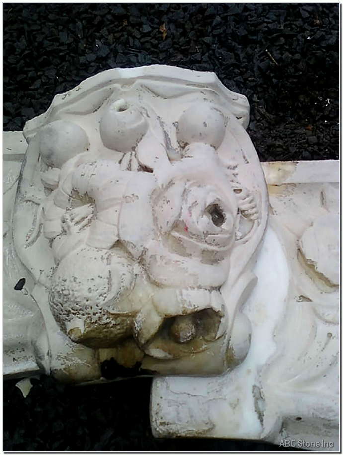 Before image of a fireplace keystone