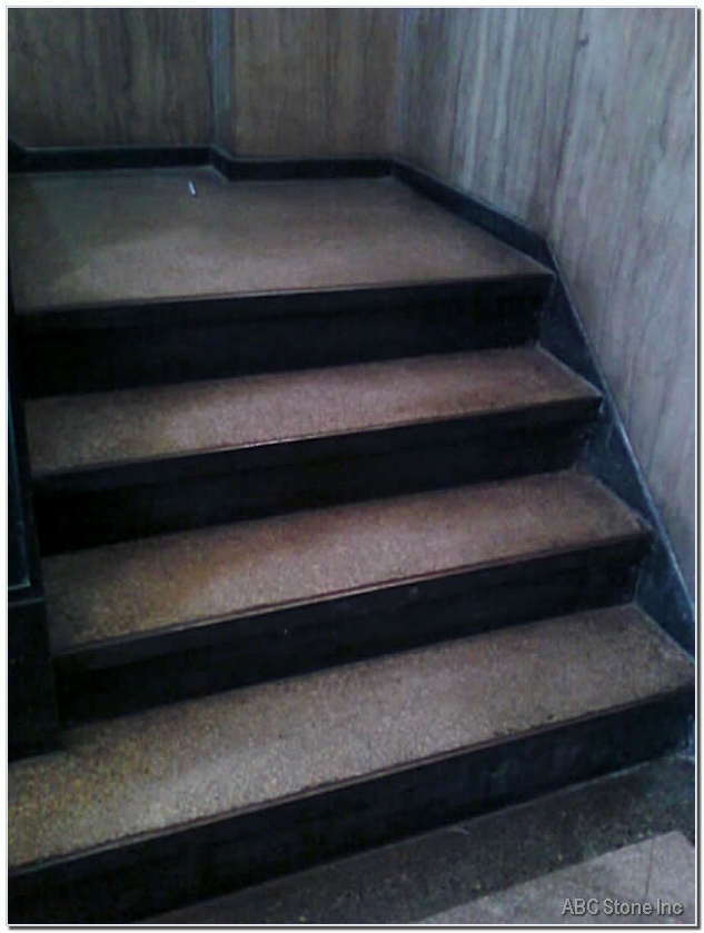 Terrazzo Steps in Need of Cleaning and Restoration in a Lobby Setting