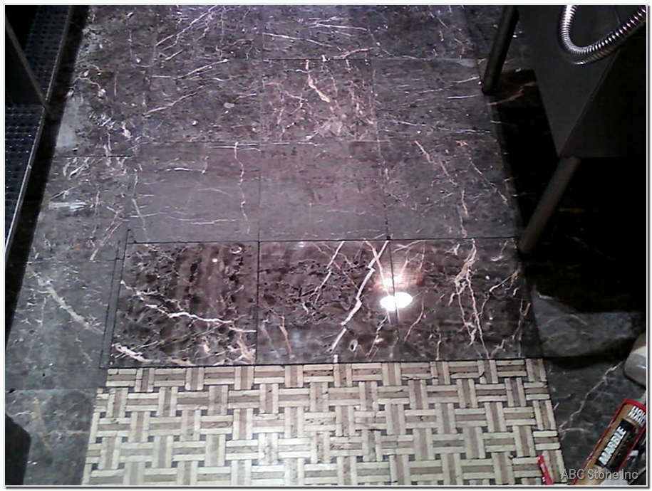 Floor tiles installation in a room