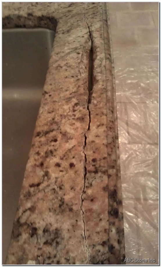 Cracked edge of a kitchen countertop