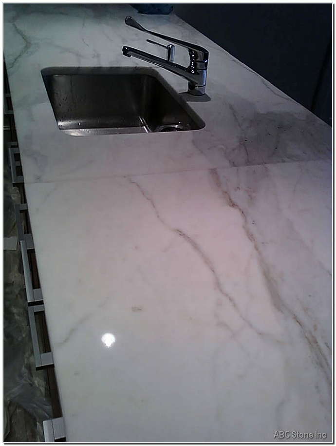 A modern and stylish kitchen countertop with granite material