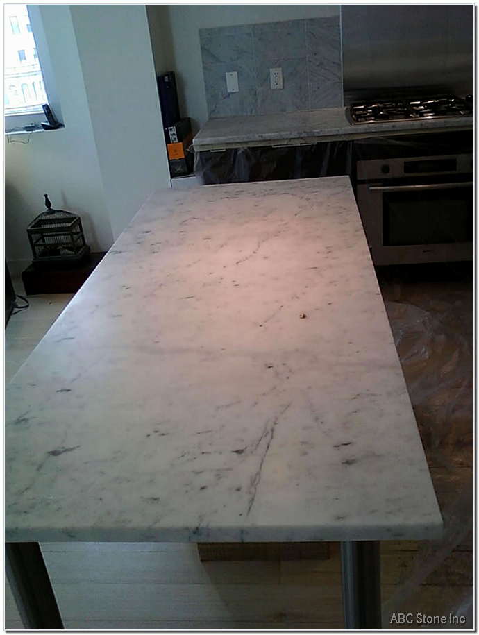 Marble kitchen island with a dull finish