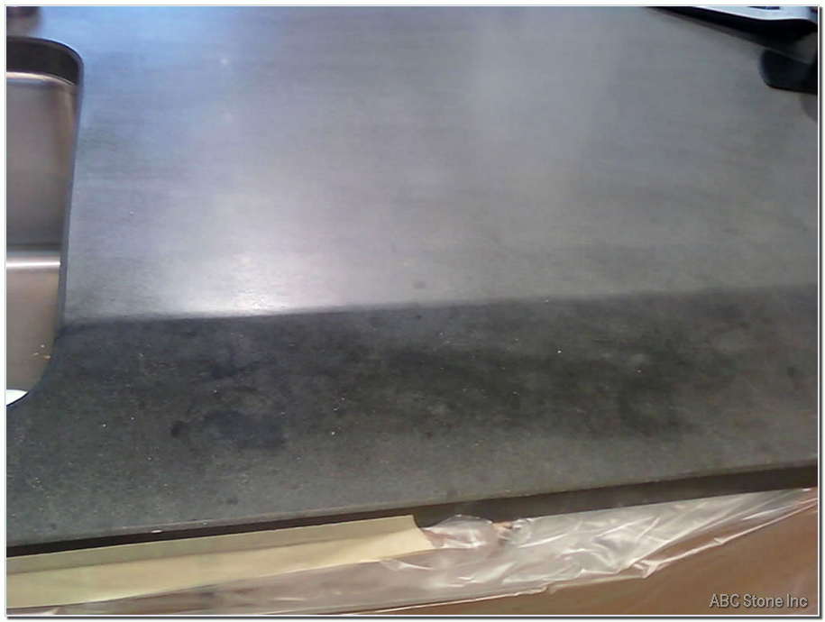 Stained limestone floor surface