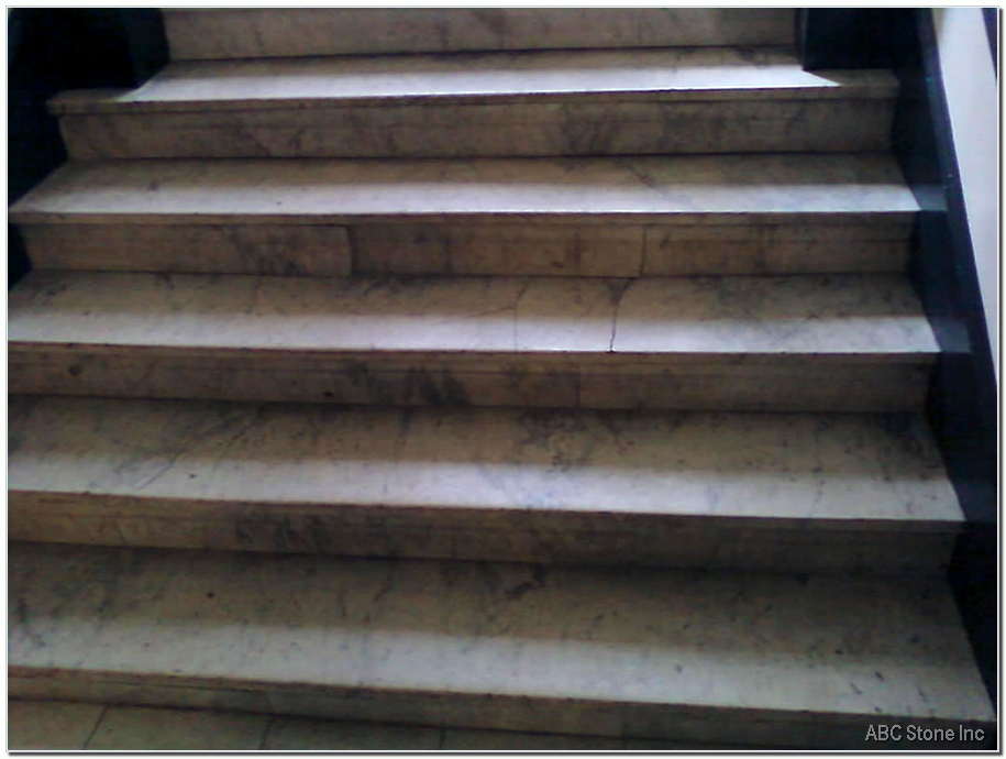 Building Foyer Marble Steps. Before Restoration