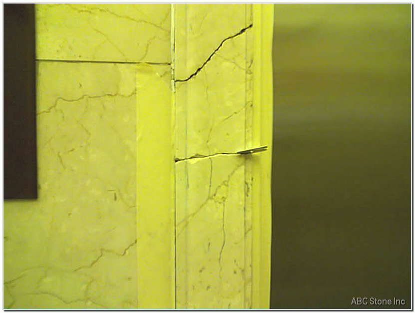 Cracked Marble Molding. Frame Around Elevator Door