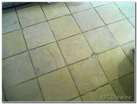 Marble floor with worn grout joints