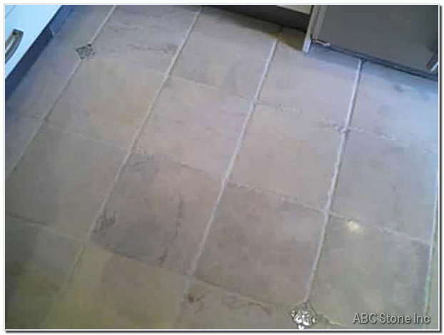 Marble tile being re grouted
