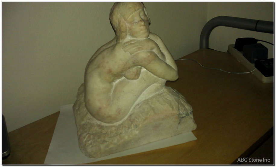 Repairing a Marble Statue