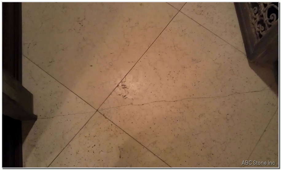Cracked marble tile on the floor