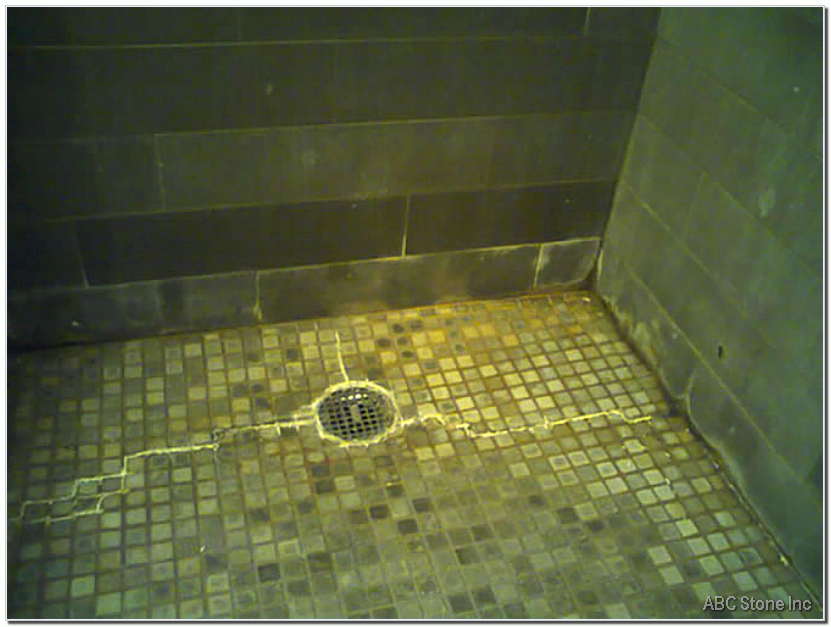 Moldy tiles on a floor before renovation
