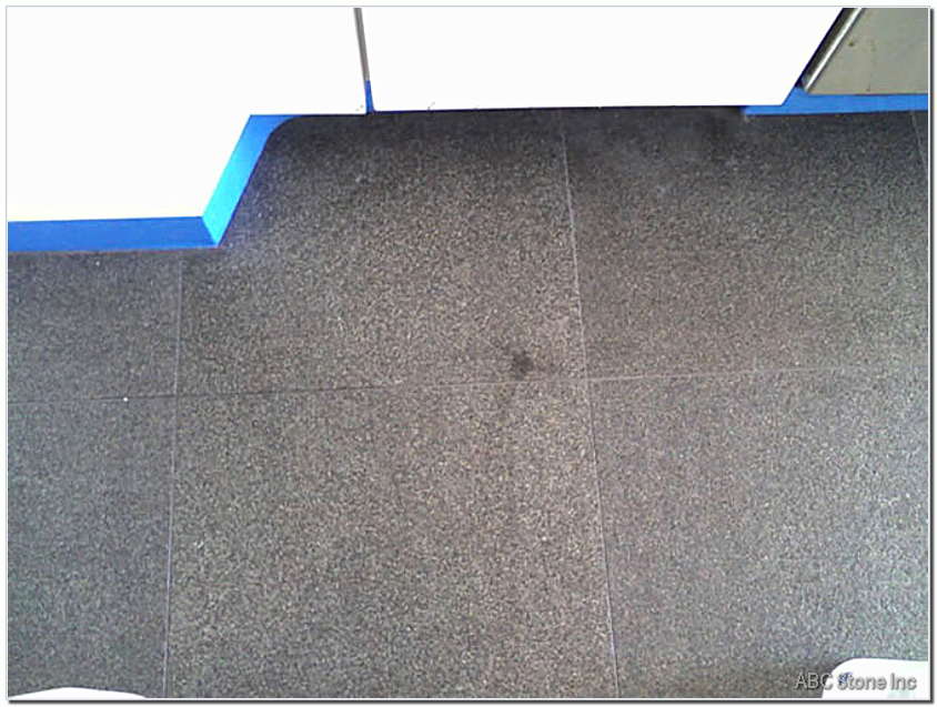 Removing Oily Stain on Granite Floor   Before Image