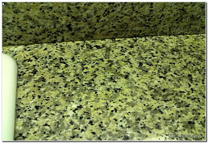 Stained circle on kitchen granite countertop