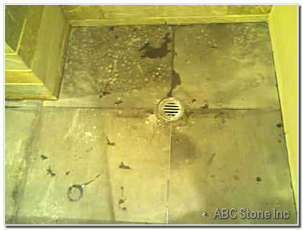 Etched and Burned Marble Floor Before Restoration