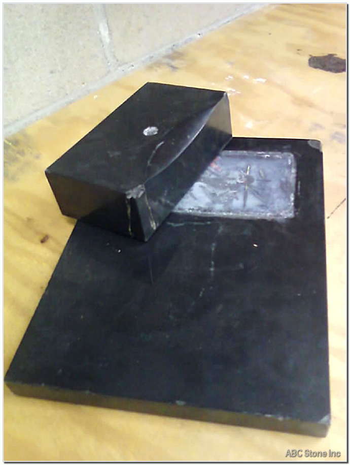 Damaged base of a statue