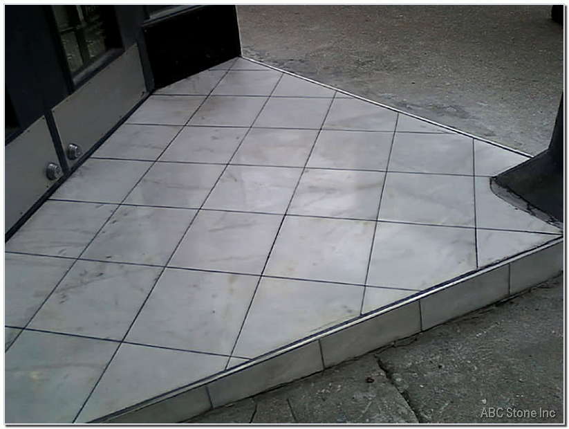 Retail store entrance with marble steps