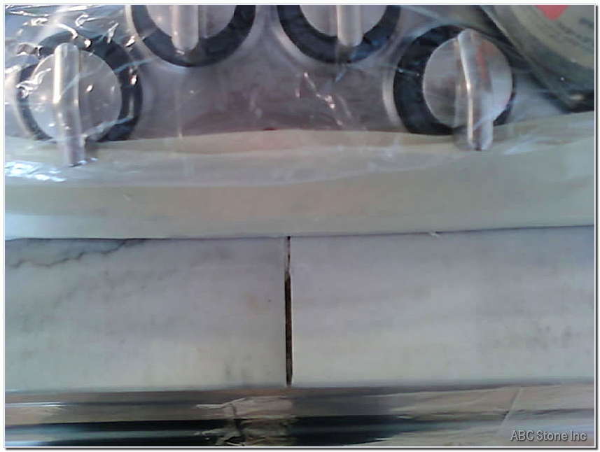Before image of front seam on a stove